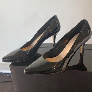 Black patent leather pumps